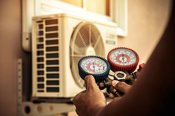 Professional Hvac technician working in Pine Village, IN